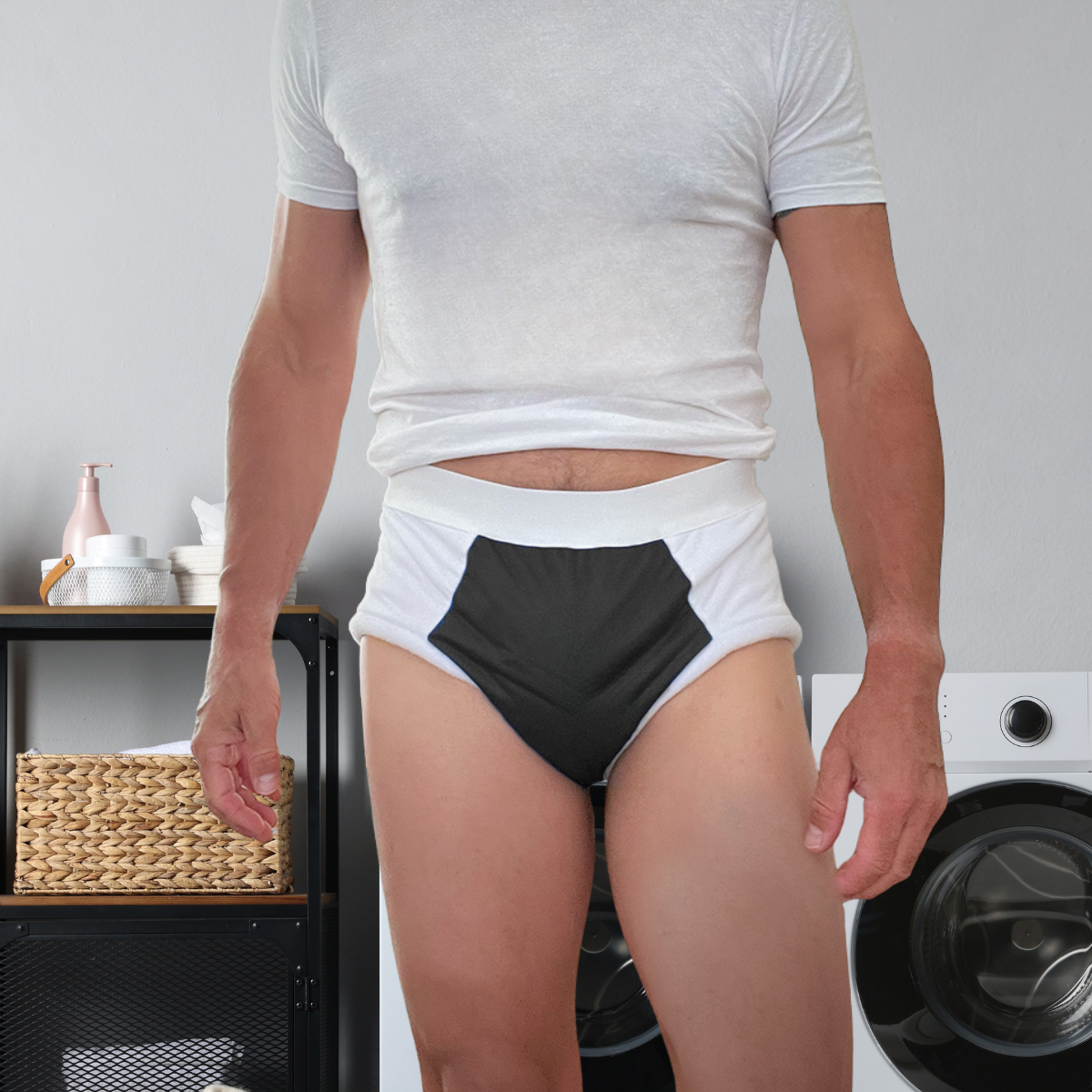 A man wearing a white t-shirt and high-waisted incontinence brief with a black front panel.